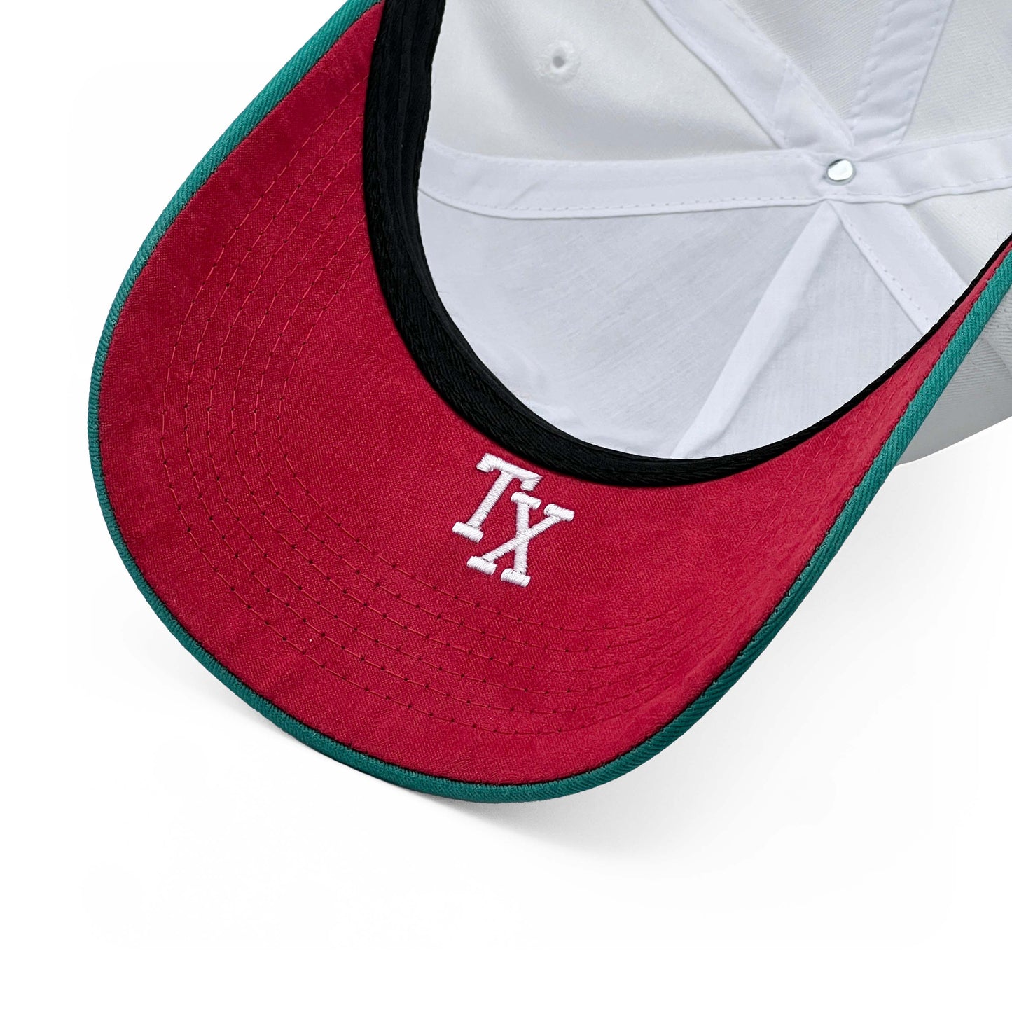 Texas Cinco de Mayo Limited 5-Panel Snapback Hat – Angled View of Red Suede Under Brim with TX Abbreviation Embroidery