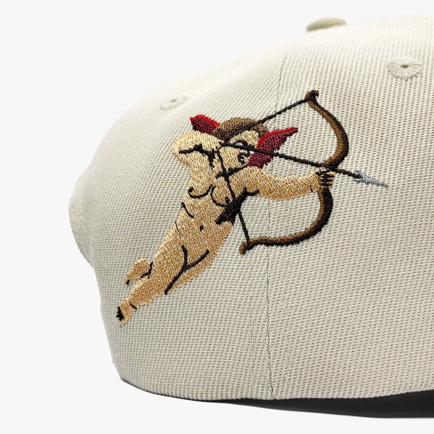 Texas Valentine’s Cream Snapback Hat – Close-Up of Cherub and Bow Embroidery on Right Side