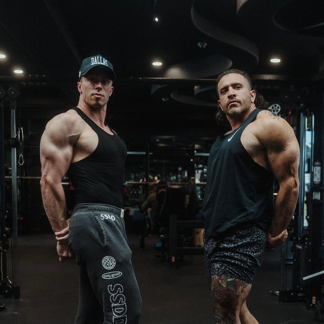 Two athletes wearing Dallas Black Snapback Hat at boxing gym