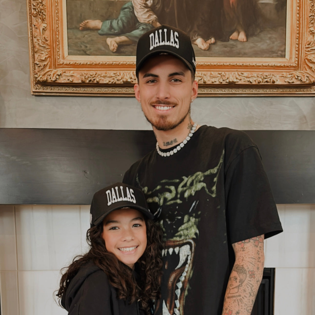 Model wearing Dallas Black Snapback Hat posing with daughter