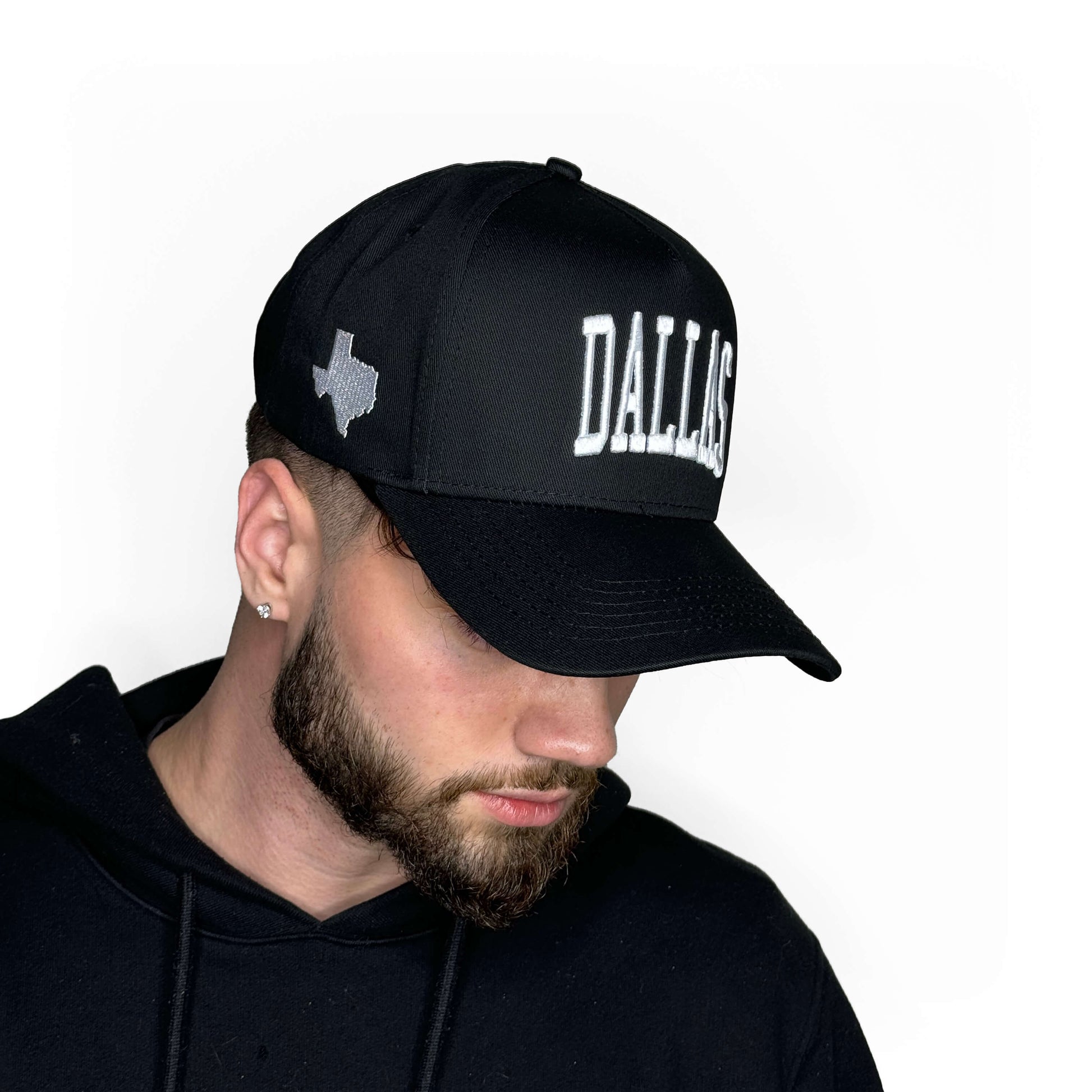 Model wearing Dallas Black Snapback Hat – Side Profile View