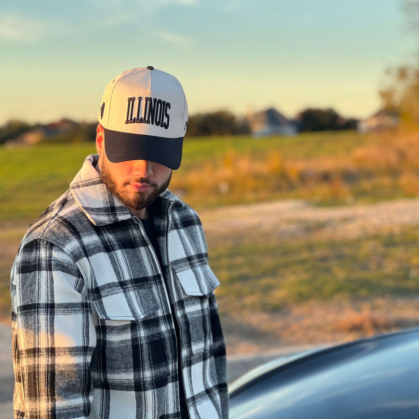 Model Wearing Illinois Off White Snapback – Outdoor Front Profile in Flannel Shirt