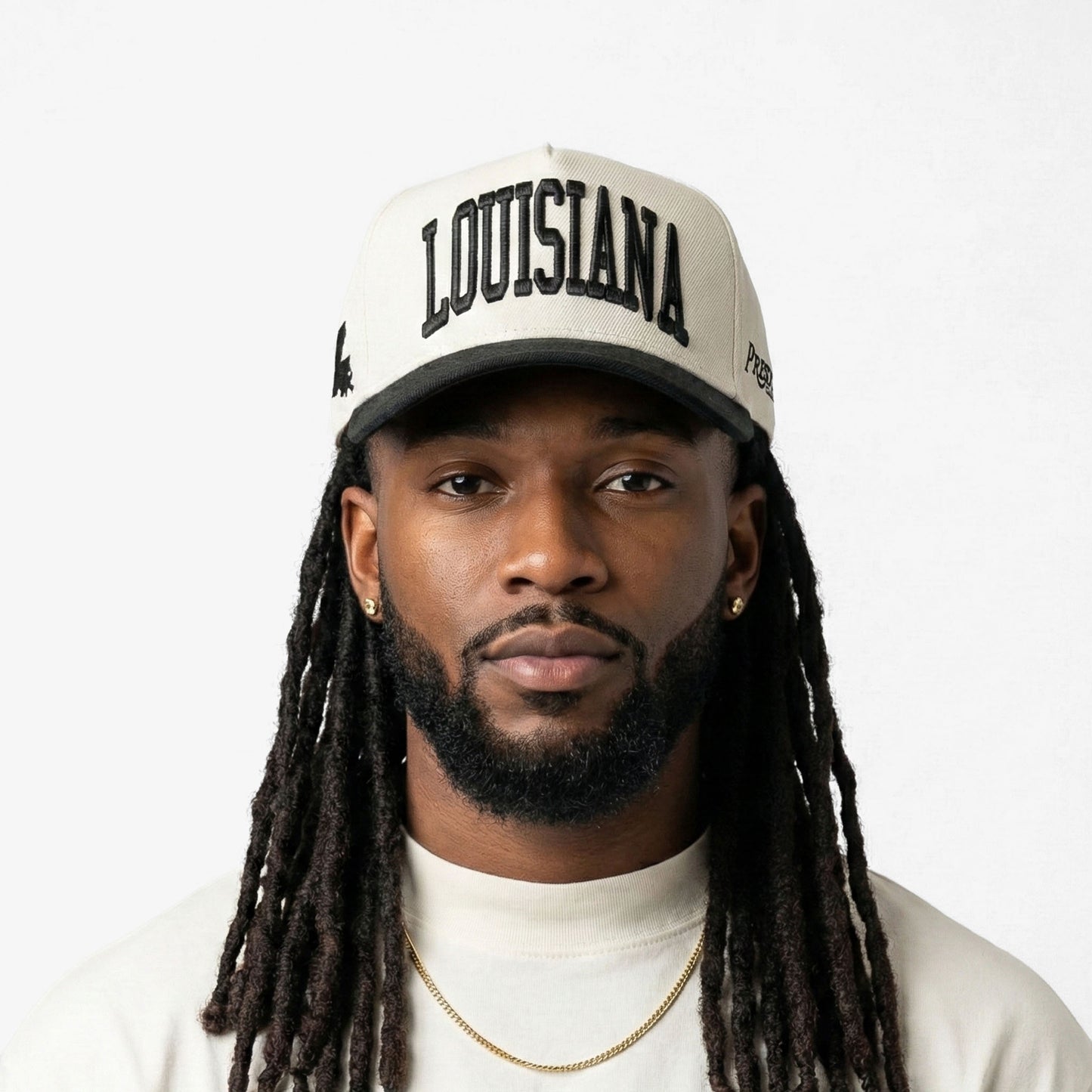 Model Wearing Louisiana Off White Snapback – Front View with 3D Embroidered Louisiana Design