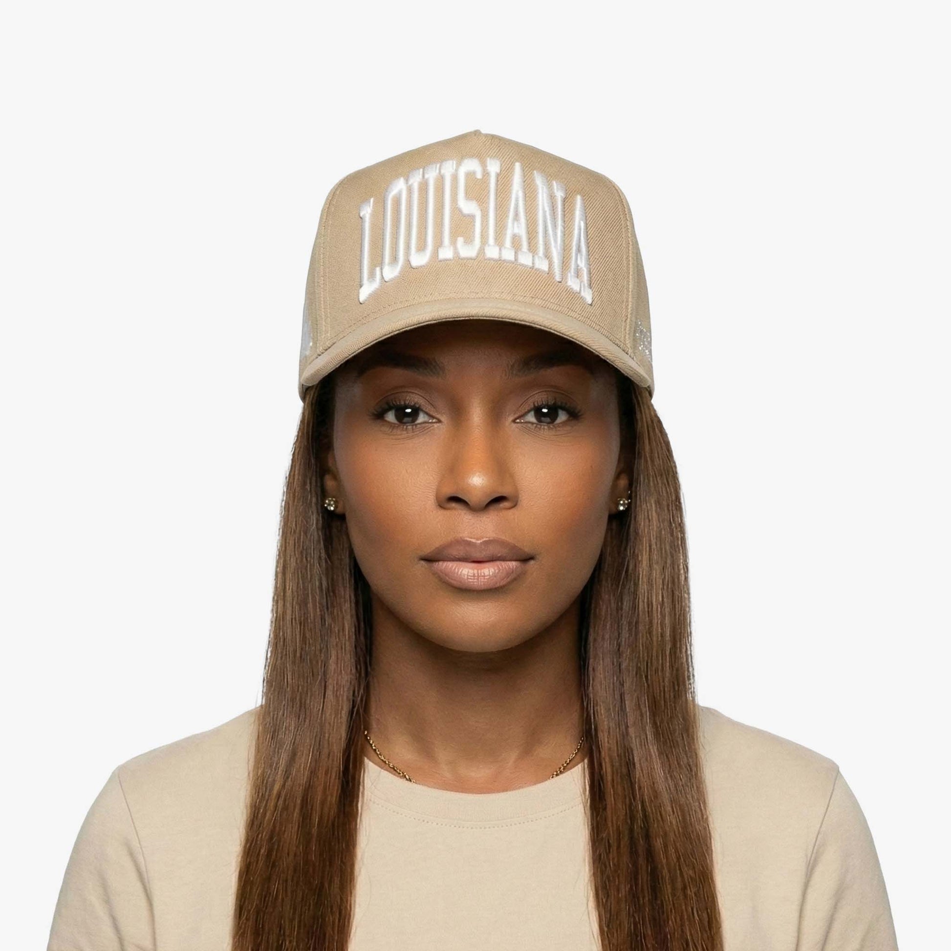 Female model wearing Louisiana sand 5 panel snapback by Prestige Collection