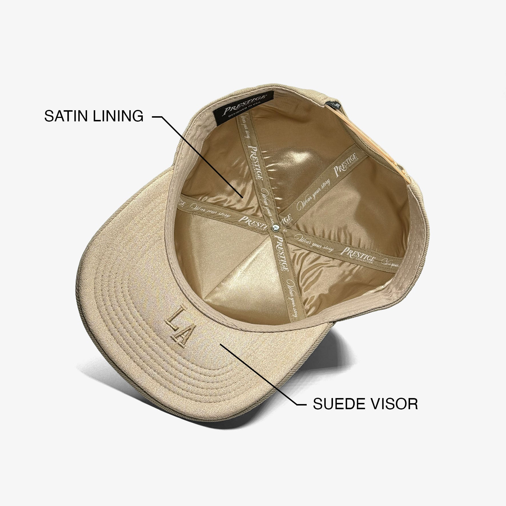 Louisiana sand 5 panel snapback interior showing satin lining, suede under brim, under brim embroidery and Wear Your Story tape
