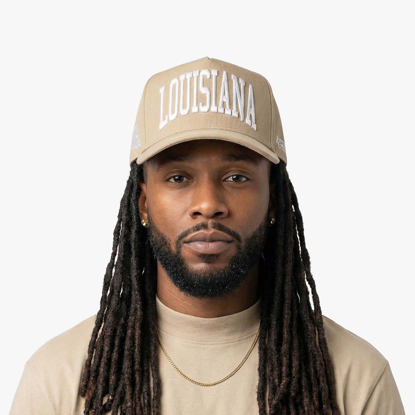 Male model wearing Louisiana sand 5 panel snapback by Prestige Collection