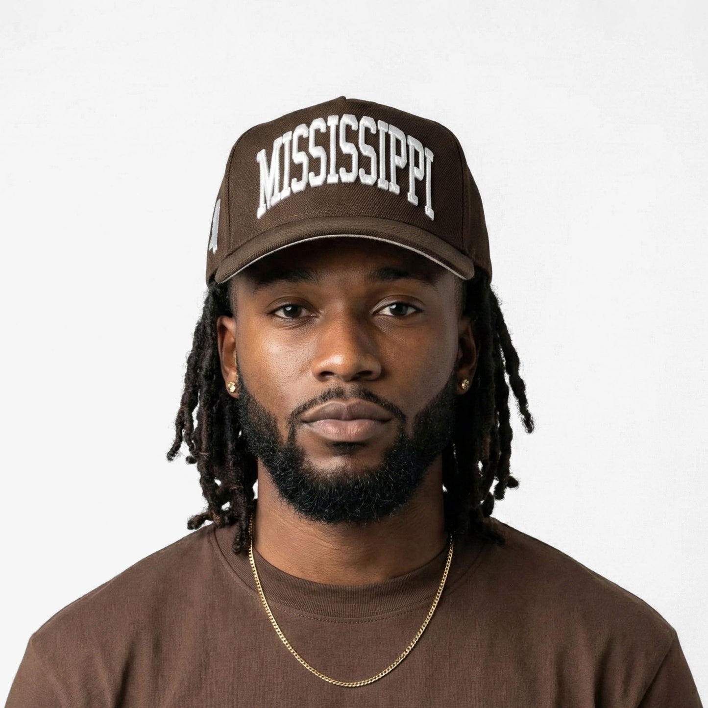 Model Wearing Mississippi Mocha Snapback – Front View with 3D Embroidered Mississippi Design