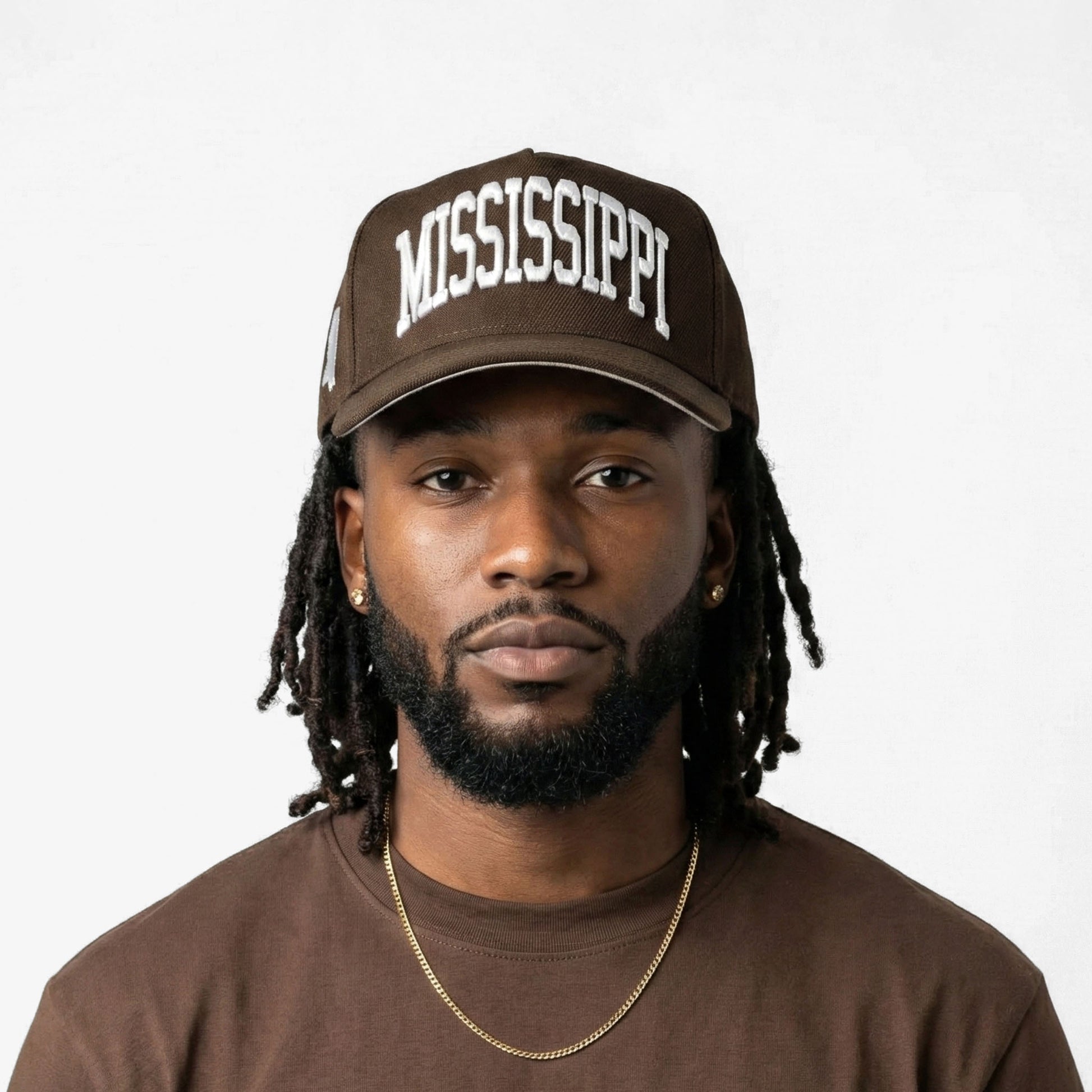 Model Wearing Mississippi Mocha Snapback – Front View with 3D Embroidered Mississippi Design